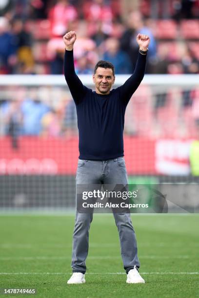 Head Coach Miguel Angel Sanchez 'Michel' of Girona FC celebrates the victory following the LaLiga Santander match between Girona FC and RCD Espanyol...