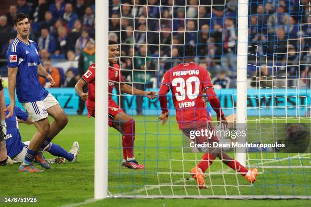 Jeremie Frimpong of Bayer 04 Leverkusen scores the team's first goal during the Bundesliga match between FC Schalke 04 and Bayer 04 Leverkusen at...