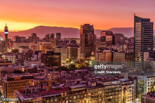 santiago skyline: a panoramic view of chile's capital - santiago chile stock pictures, royalty-free photos & images