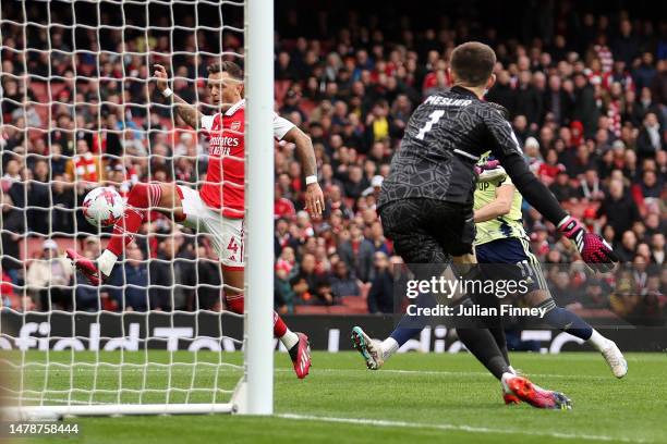 Ben White of Arsenal scores the team's second goal past Illan Meslier of Leeds United during the Premier League match between Arsenal FC and Leeds...