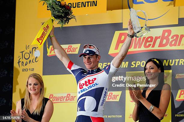 Andre Greipel of Germany riding for Lotto-Belisol celebrates on the podium after he won stage five of the 2012 Tour de France from Rouen to...