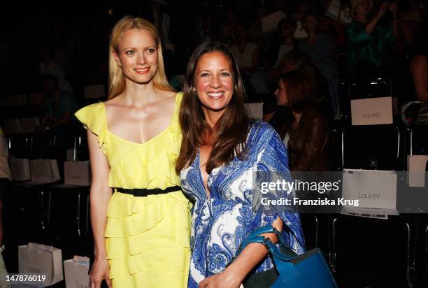 Franziska Knuppe and Dana Schweiger sit in front row during the Laurel Show during the Mercedes-Benz Fashion Week Spring/Summer 2013 on July 5, 2012...