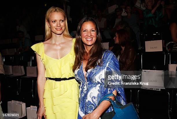 Franziska Knuppe and Dana Schweiger sit in front row during the Laurel Show during the Mercedes-Benz Fashion Week Spring/Summer 2013 on July 5, 2012...