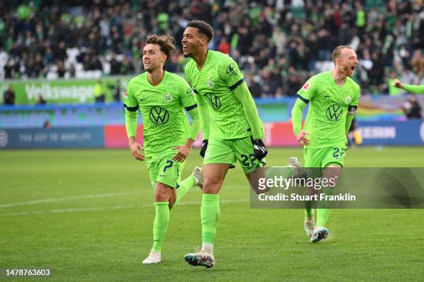 Felix Nmecha of VfL Wolfsburg celebrates after scoring the team's second goal during the Bundesliga match between VfL Wolfsburg and FC Augsburg at...