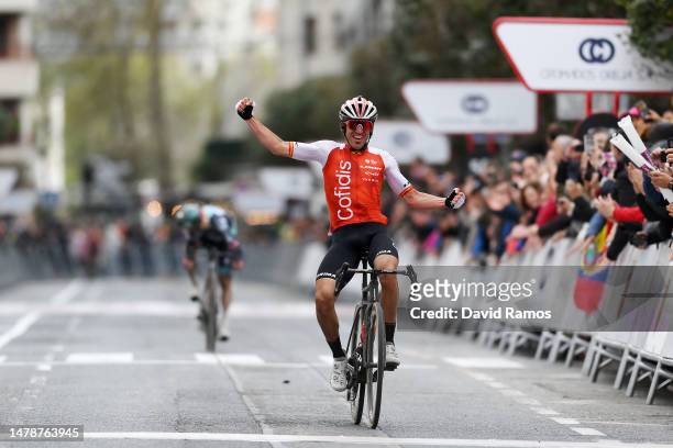 Ion Izaguirre of Spain and Team Cofidis celebrates at finish line as race winner ahead of Sergio Andres Higuita Garcia of Colombia and Team BORA –...