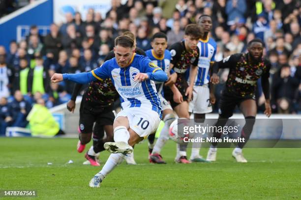 Alexis Mac Allister of Brighton & Hove Albion scores the team's third goal from a penalty kick during the Premier League match between Brighton &...