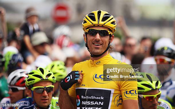 Race leader Fabian Cancellara of Switzerland and Radioshack-Nissan looks on at the start of stage five of the 2012 Tour de France from Rouen to...