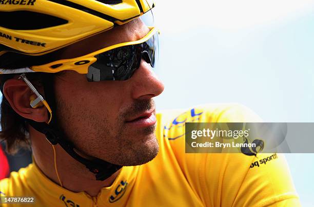 Race leader Fabian Cancellara of Switzerland and Radioshack-Nissan looks on at the start of stage five of the 2012 Tour de France from Rouen to...