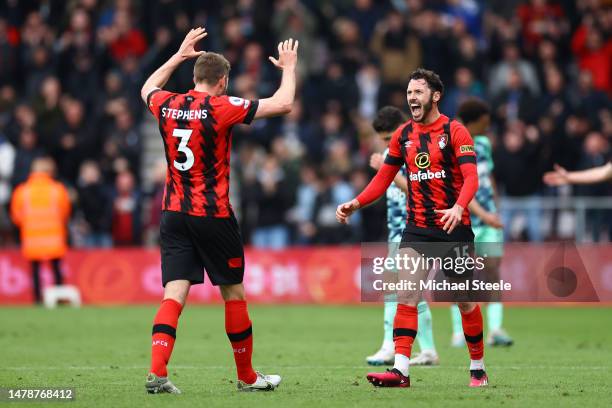 Adam Smith and Jack Stephens of AFC Bournemouth celebrate after the team's victory during the Premier League match between AFC Bournemouth and Fulham...