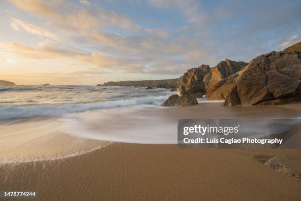 waves softly arriving to a lonely beach in the northwestern coast of spain in spring - ferrol stock pictures, royalty-free photos & images