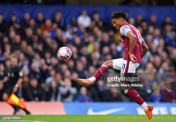 Ollie Watkins of Aston Villa scores the team's first goal during the Premier League match between Chelsea FC and Aston Villa at Stamford Bridge on...