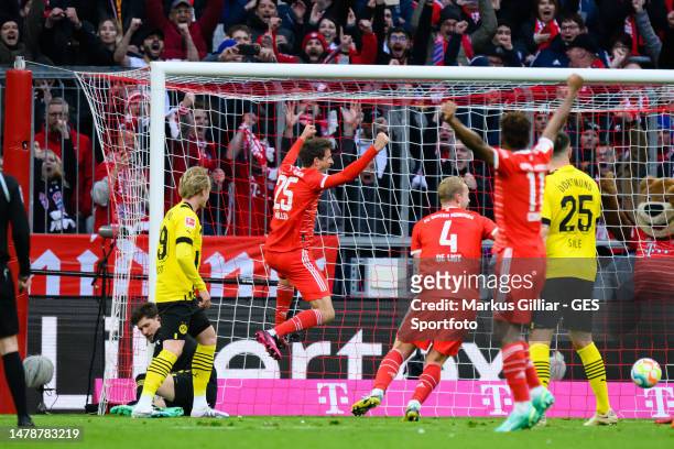 Thomas Mueller of Bayern celebrates after scoring his team's second goal during the Bundesliga match between FC Bayern München and Borussia Dortmund...