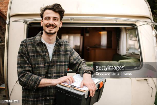 portrait of a man in front of a camper van - car toolbox stock pictures, royalty-free photos & images