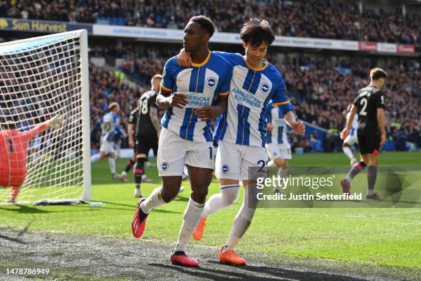 Danny Welbeck of Brighton & Hove Albion celebrates after scoring the team's second goal with Kaoru Mitoma of Brighton & Hove Albion during the...