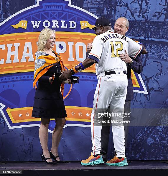 Dustin Baker Dusty Baker Jr. #12 of the Houston Astros receives his 2022 World ...