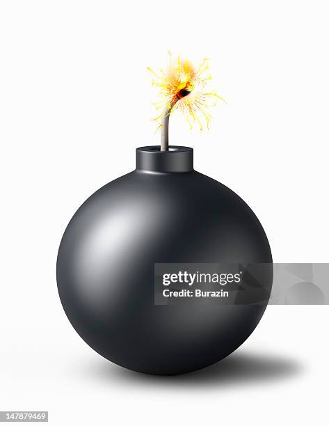 bomb with burning fuse - bomb fotografías e imágenes de stock
