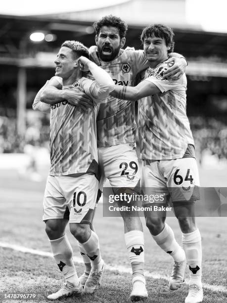Daniel Podence of Wolverhampton Wanderers celebrates after scoring the team's first goal during the Premier League match between Nottingham Forest...