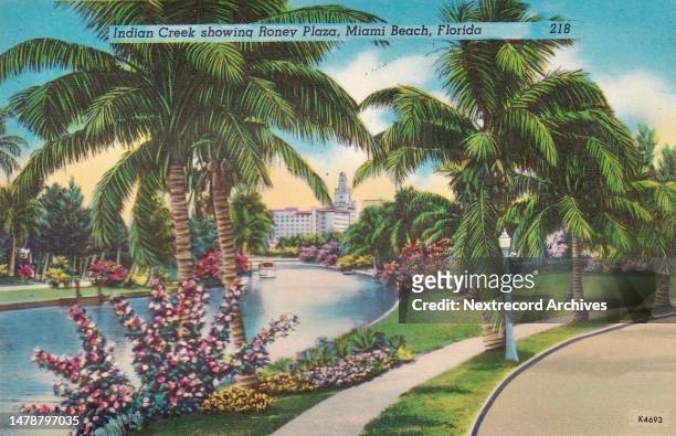 Vintage colorized historic souvenir photo postcard published circa 1945 as part of a series titled, 'Miami Beach,' depicting a view of the elegant...