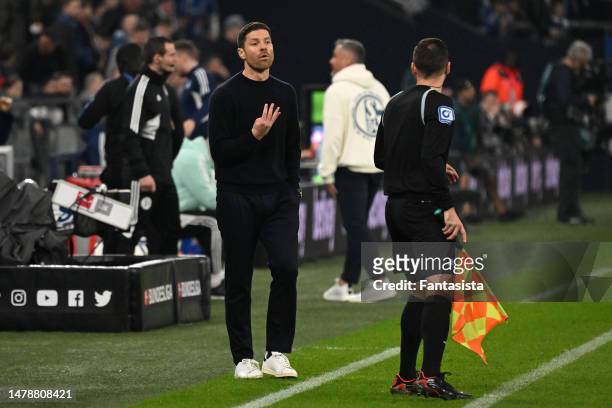 Bayer 04 Leverkusen coach Xabi Alonso gestures to the fourth offcial during the Bundesliga match between FC Schalke 04 and Bayer 04 Leverkusen at...