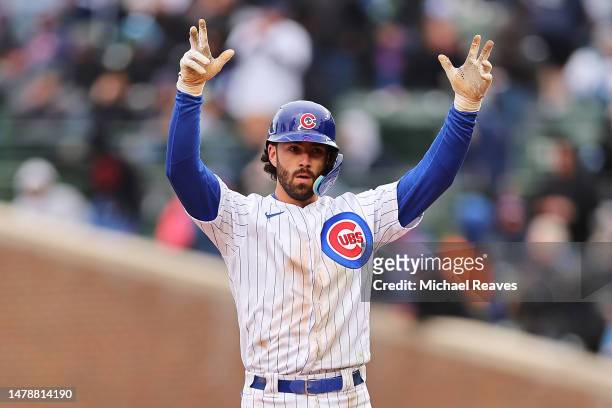 Dansby Swanson of the Chicago Cubs reacts after hitting a double against the Milwaukee Brewers during the fourth inning at Wrigley Field on April 01,...