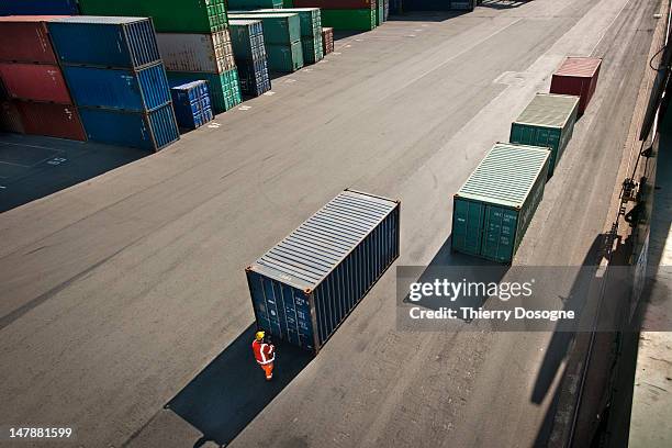 containers on dock - rail freight stock pictures, royalty-free photos & images