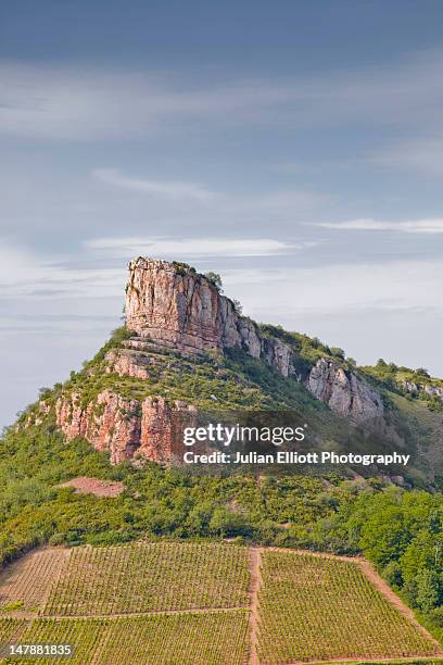 the roche de solutre in burgundy - roche de solutre stock pictures, royalty-free photos & images