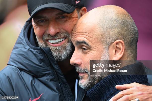 Liverpool manager Jurgen Klopp greets Manchester City manager Pep Guardiola before the Premier League match between Manchester City and Liverpool FC...