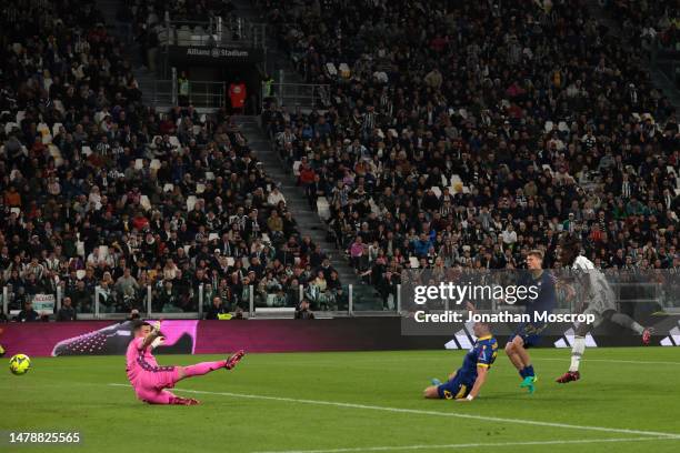 Moise Kean scores to give the side a 1-0 lead during the Serie A match between Juventus and Hellas Verona at Allianz Stadium on April 01, 2023 in...