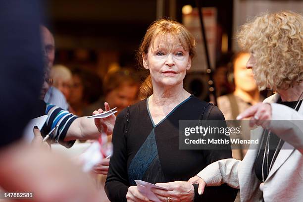 Angelica Domroese walks the red carpet at the premiere of 'Bis Zum Horizont, Dann Links!' at Lichtburg on July 5, 2012 in Essen, Germany.