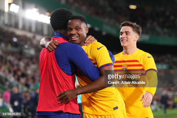 Ansu Fati of FC Barcelona celebrates with teammate Alejandro Balde after scoring the team's second goal during the LaLiga Santander match between...