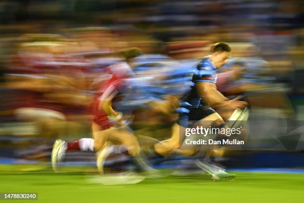 Josh Adams of Cardiff makes a break during the EPCR Challenge Cup Round of Sixteen match between Cardiff Rugby and Sale Sharks at Cardiff Arms Park...