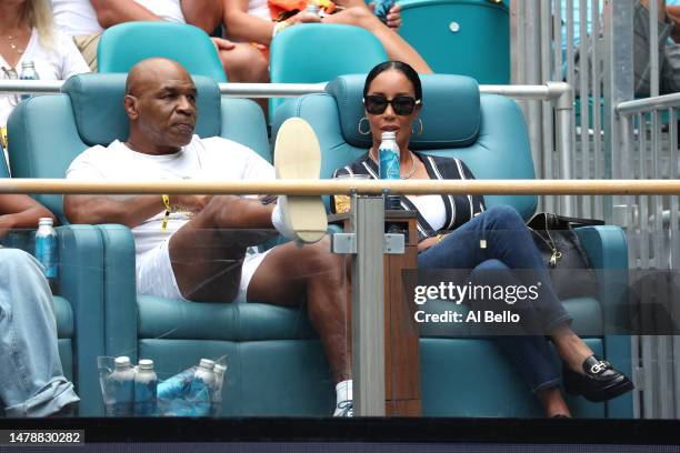 Boxer Mike Tyson and his wife Kiki Tyson watch the Final match between Petra Kvitova of Czechia against Elena Rybakina of Kazakhstan at the Miami...