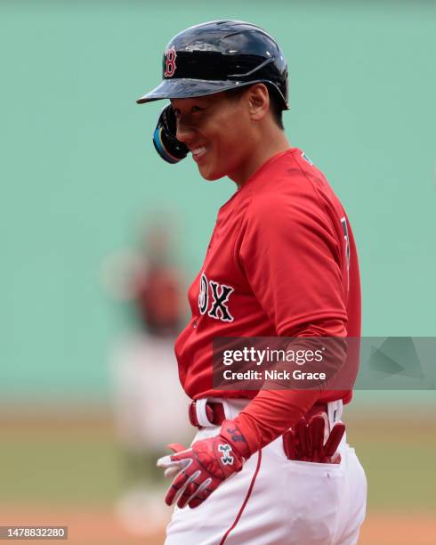 Masataka Yoshida of the Boston Red Sox reacts during the first inning against the Baltimore Orioles at Fenway Park on April 01, 2023 in Boston,...