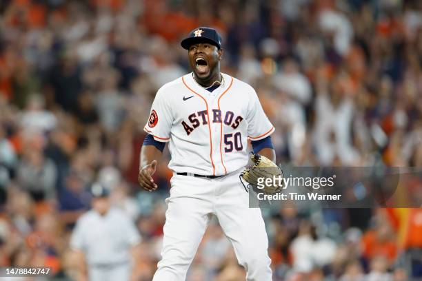Hector Neris of the Houston Astros reacts after final out of the game against the Chicago White Sox at Minute Maid Park on April 01, 2023 in Houston,...