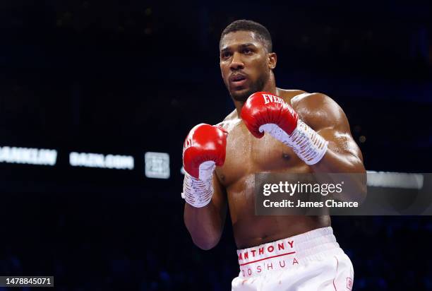 Anthony Joshua looks on during the Heavyweight fight between Anthony Joshua and Jermaine Franklin at The O2 Arena on April 01, 2023 in London,...