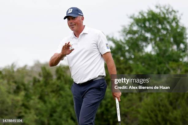 Matt Kuchar of the United States reacts after making birdie on the 17th green during the third round of the Valero Texas Open at TPC San Antonio on...