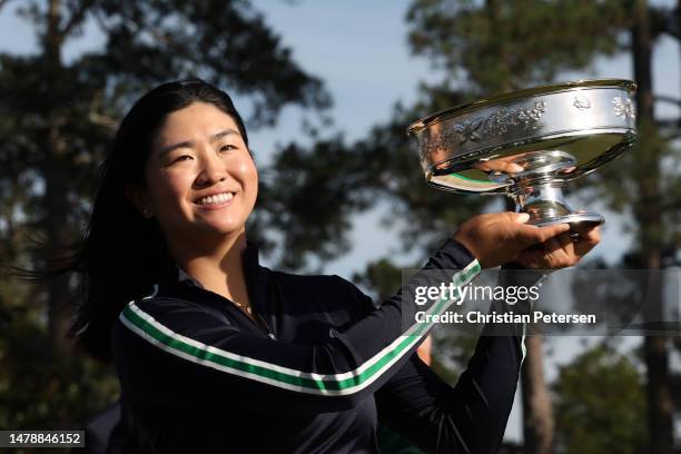 Rose Zhang of the United States celebrates with the trophy after winning in a playoff during the final round of the Augusta National Women's Amateur...
