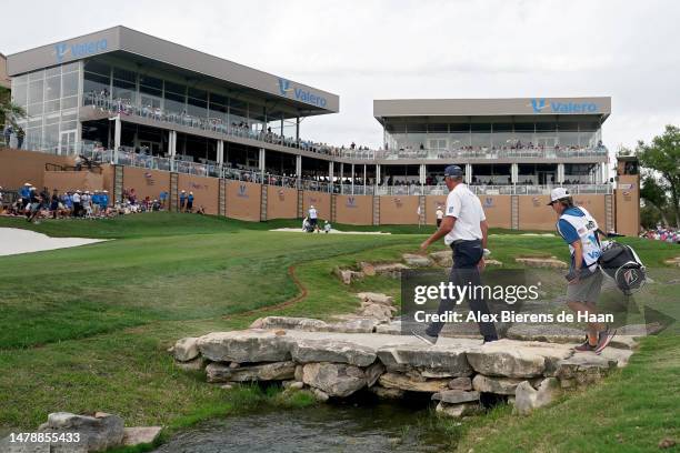 Matt Kuchar of the United States walks across the 18th hole during the third round of the Valero Texas Open at TPC San Antonio on April 01, 2023 in...
