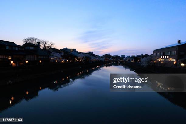 view of asano river in kanazawa, japan - lantern festival cherry blossom stockfoto's en -beelden