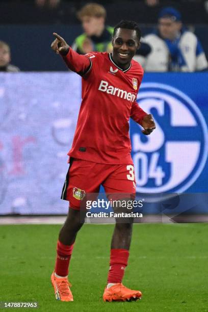 Jeremie Frimpong of Bayer 04 Leverkusen celebrates scoring the opening goal during the Bundesliga match between FC Schalke 04 and Bayer 04 Leverkusen...