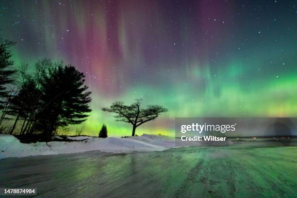 northern lights over detroit point - michigan lakeshore stock pictures, royalty-free photos & images