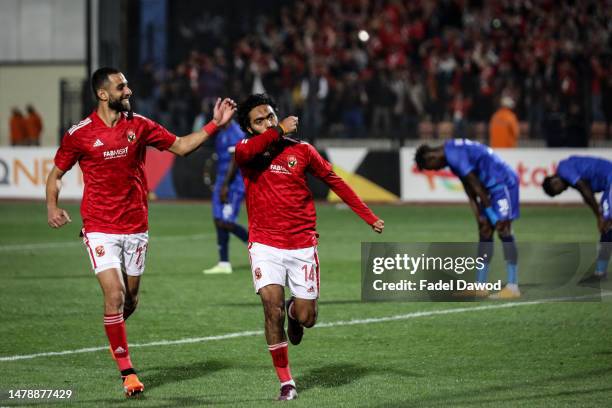 Al Ahly's Hussein El Shahat celebrates after scoring their third goal with Amr El Solia at Cairo International Stadium on April 1, 2023 in Cairo,...