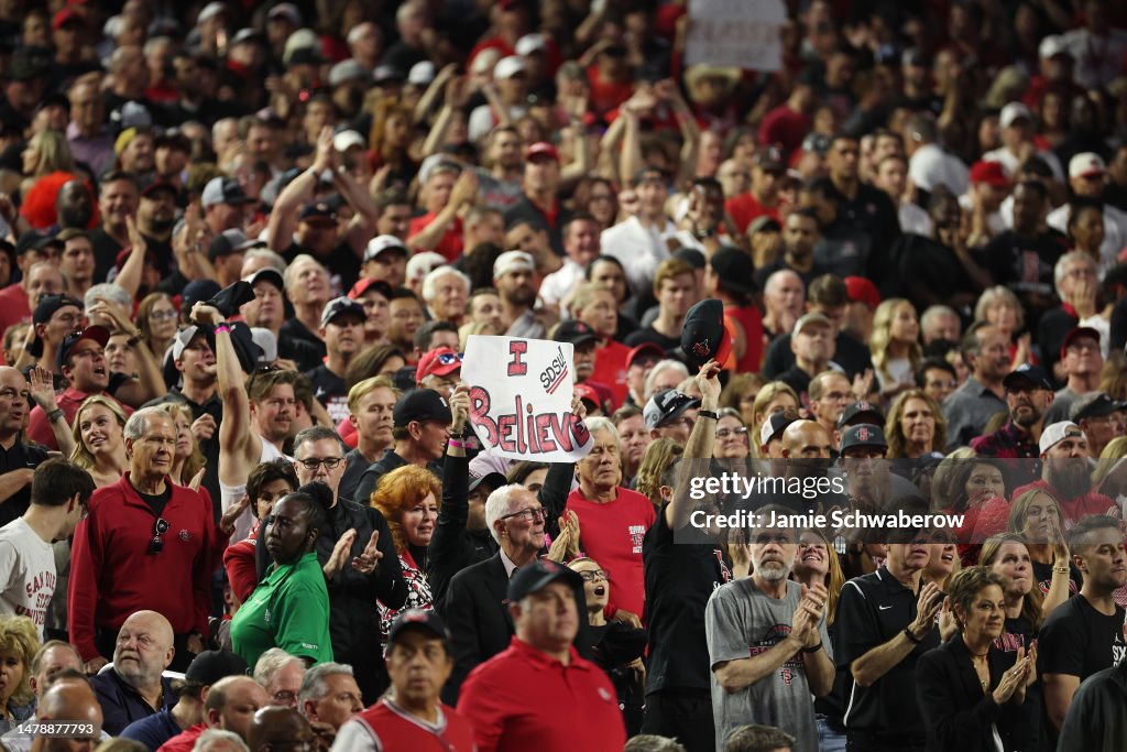 Aztecs Fla Fans of the San Diego State Aztecs hold up signs and clap during the ...