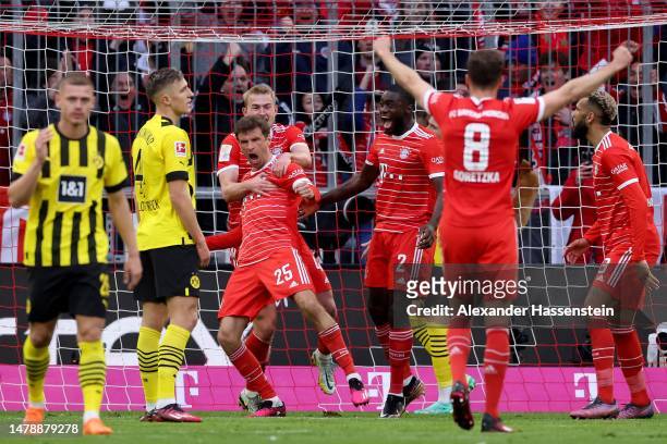 Thomas Müller of Bayern München celebrates scoring the 2nd team goal during the Bundesliga match between FC Bayern München and Borussia Dortmund at...
