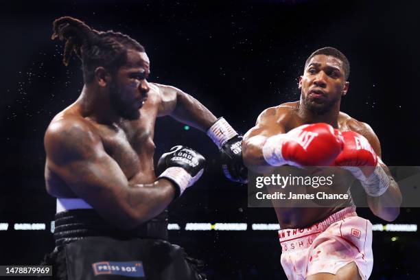 Anthony Joshua punches Jermaine Franklin during the Heavyweight fight between Anthony Joshua and Jermaine Franklin at The O2 Arena on April 01, 2023...