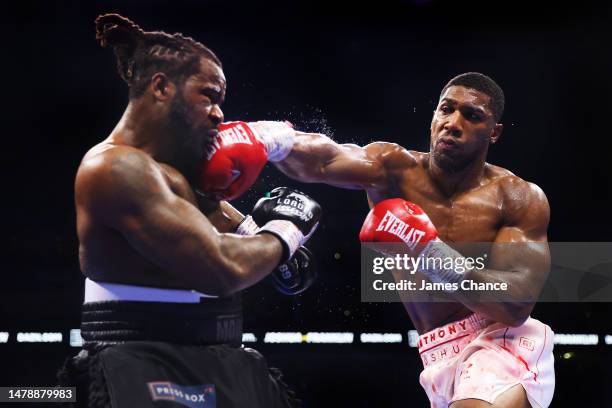 Anthony Joshua punches Jermaine Franklin during the Heavyweight fight between Anthony Joshua and Jermaine Franklin at The O2 Arena on April 01, 2023...