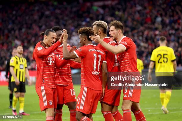 Kingsley Coman of Bayern München celebrates scoring the 4th team goal during the Bundesliga match between FC Bayern München and Borussia Dortmund at...