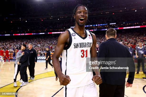 Nathan Mensah of the San Diego State Aztecs reacts after defeating the Florida Atlantic Owls 72-71 during the NCAA Men’s Basketball Tournament Final...