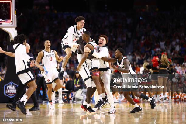 San Diego State Aztecs players celebrate after defeating the Florida Atlantic Owls 72-71 during the NCAA Men’s Basketball Tournament Final Four...