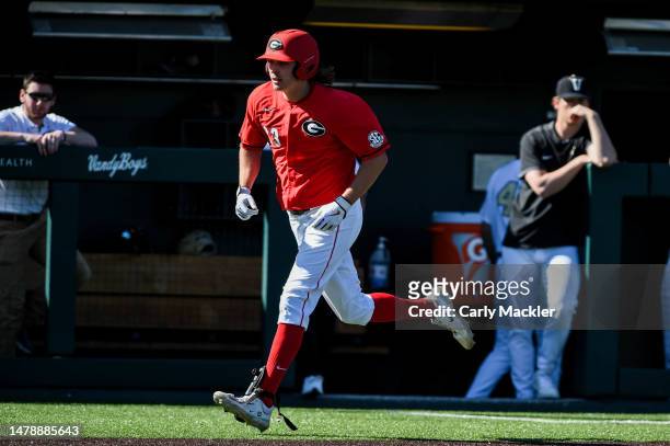 Connor Tate of the Georgia Bulldogs runs in from a home run against the Vanderbilt Commodores at Hawkins Field on April 1, 2023 in Nashville,...